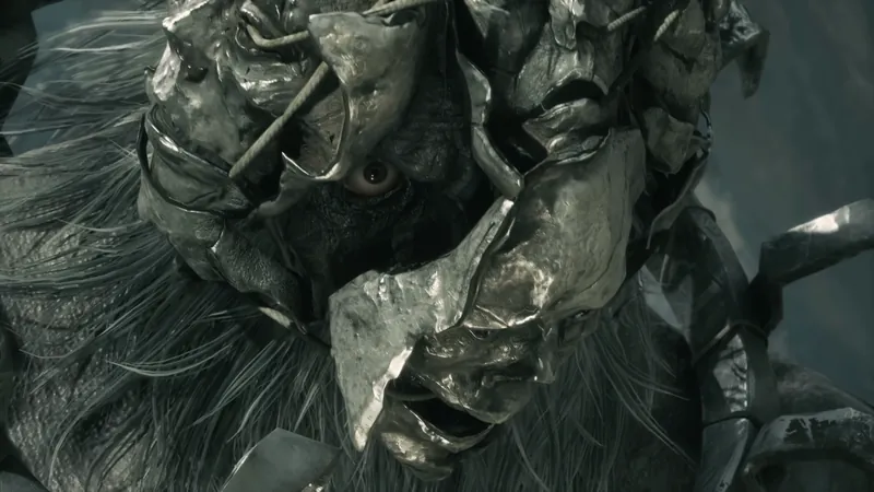 A face under crumpled metal plates.