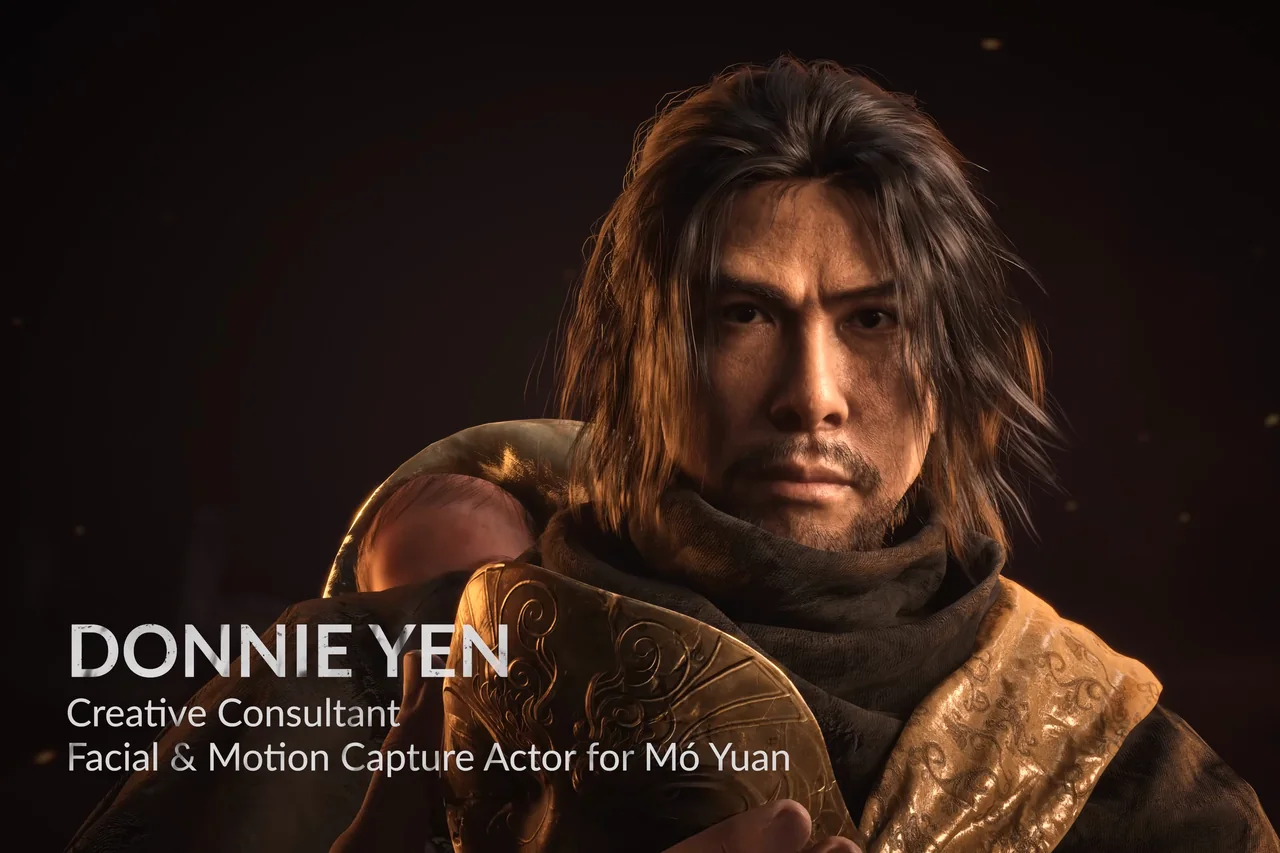 Close-up of a long-haired man beside a title card.
