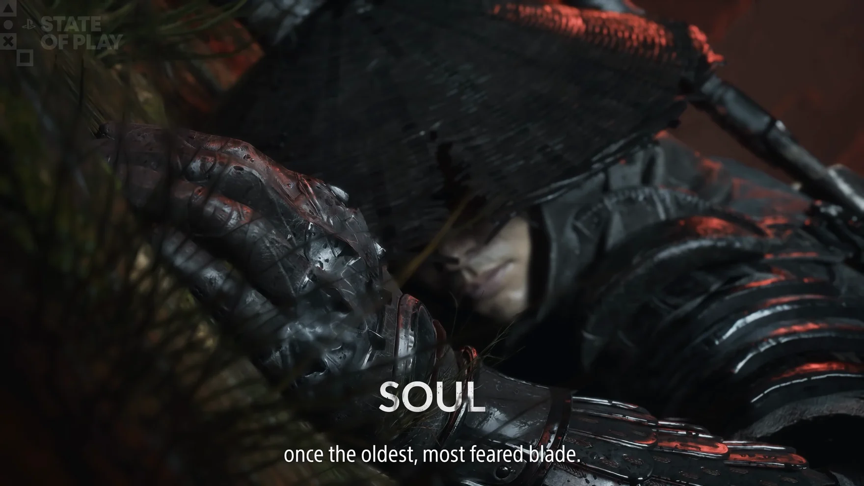 Close-up of a figure in a straw hat and dark armour with red trim; the word “SOUL” on screen.