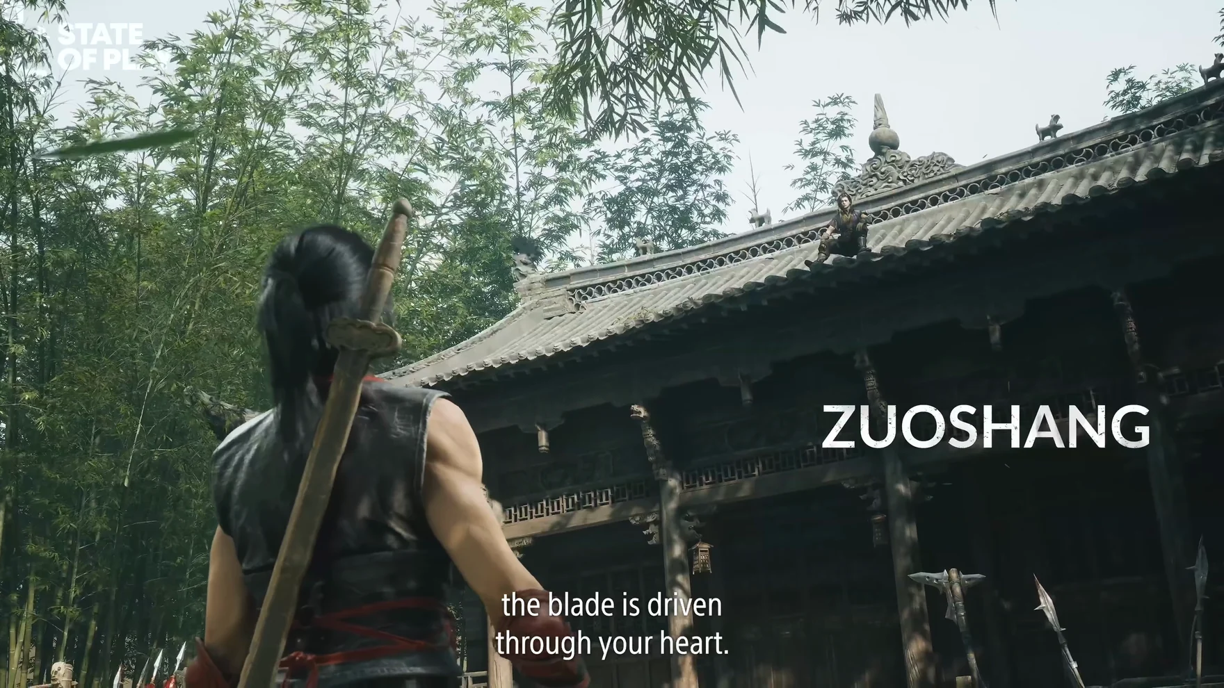 Seen from behind, a long-haired figure with a sword on his back faces a temple hall in a bamboo grove; the word “ZUOSHANG” on screen.