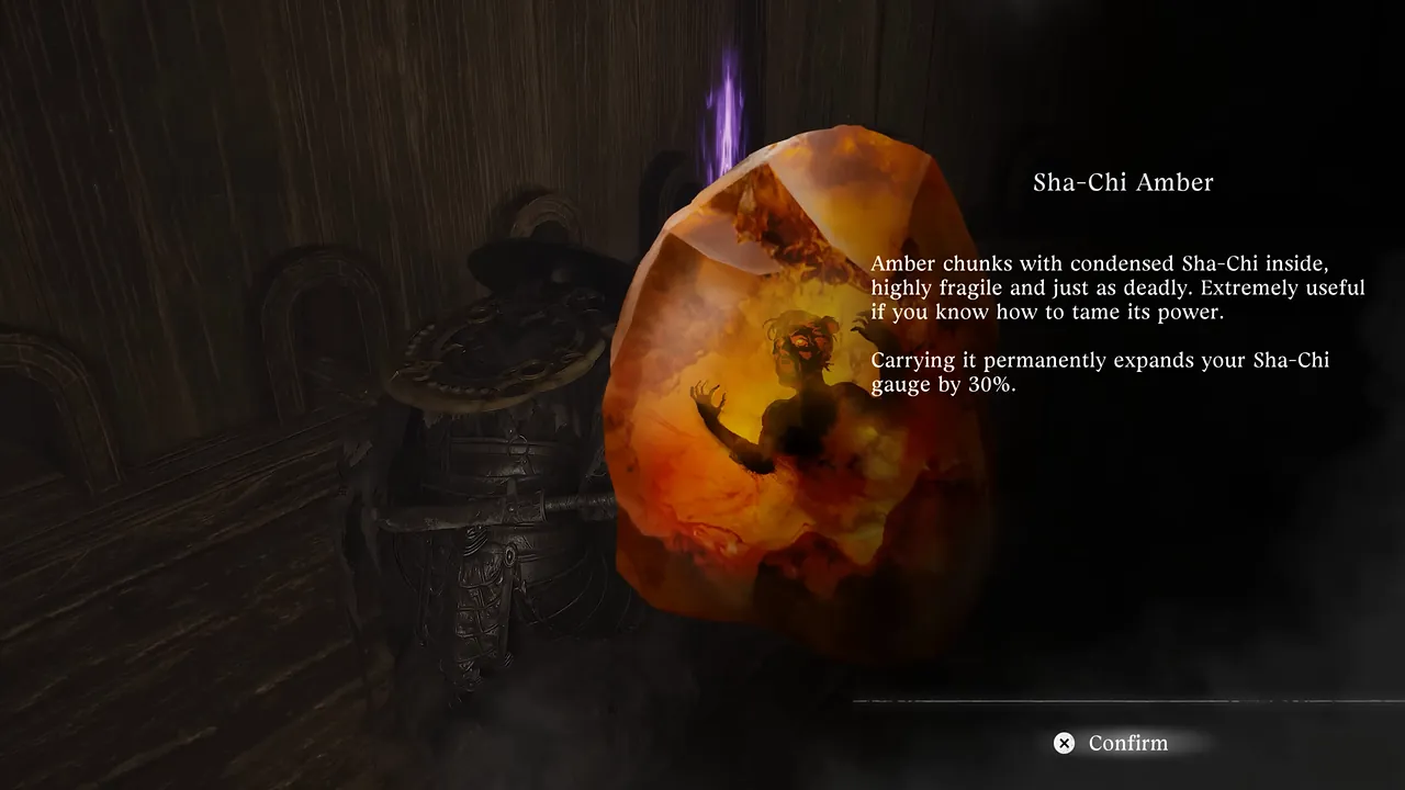 An item card: a glowing orange amber shard beside the title Sha-Chi Amber and its description.