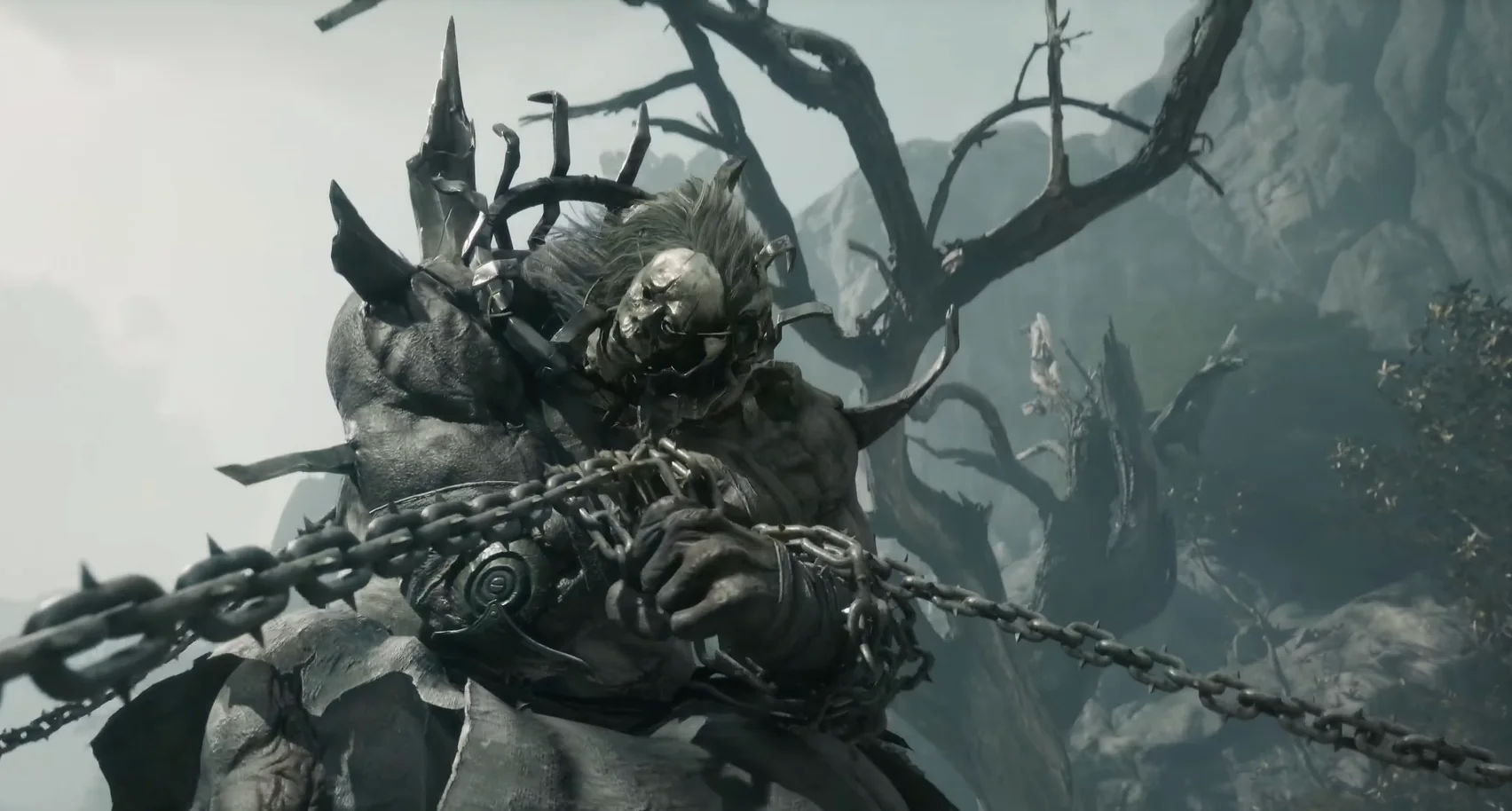 A giant seated figure with branch-like growths and chains in grey mist.