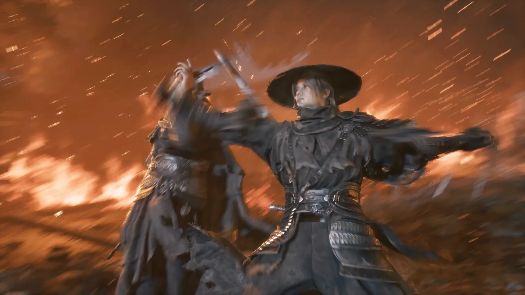 Two fighters in wide hats clash in front of flames.