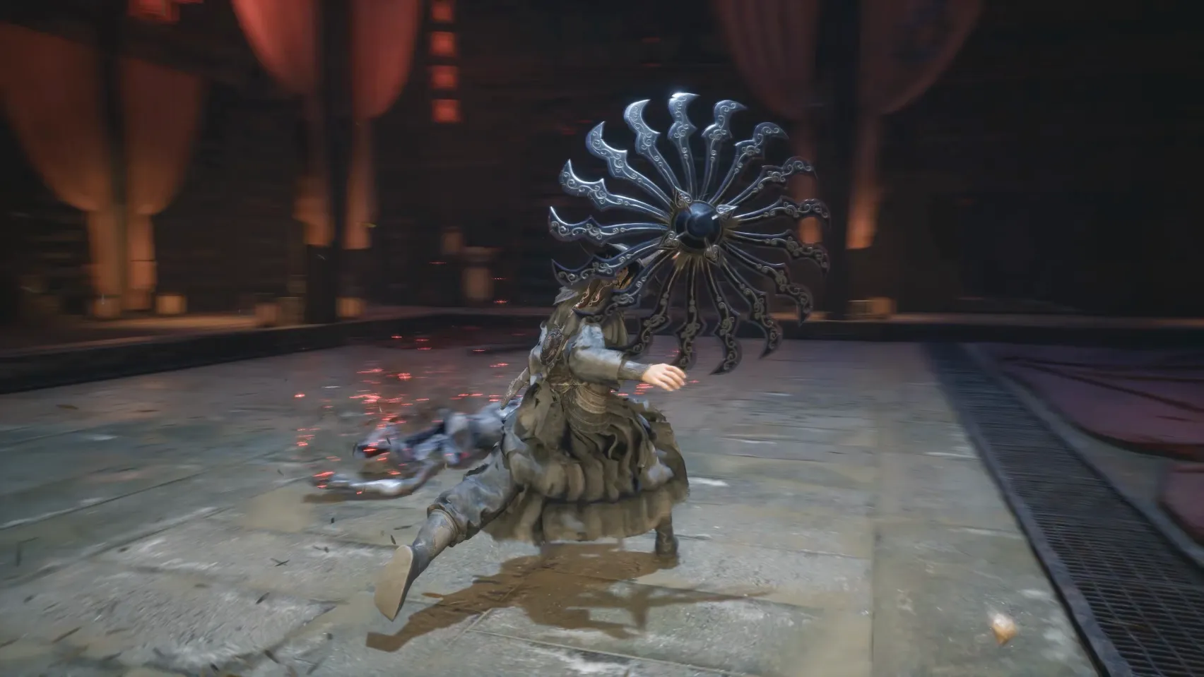 A fighter crouches behind an open metal umbrella on a stone floor in a red hall.