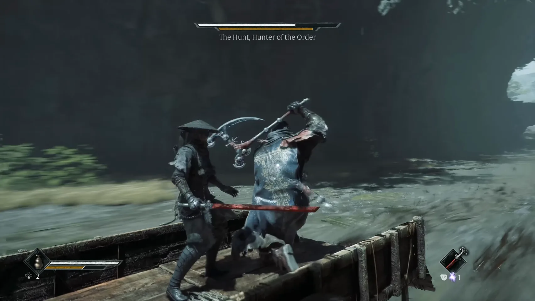On a cart bed a hooded figure brings two curved blades down at a figure blocking with a red blade.
